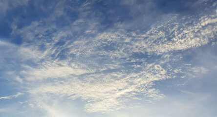 cloudy sky background at dawn time with sunset light.