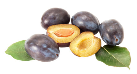 sliced plums with green leaves isolated on white background