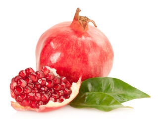 pomegranate with green leaves isolated on white background