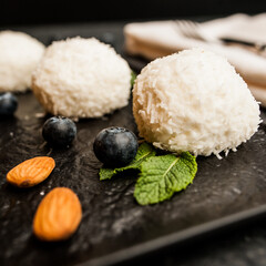 Coconut balls with almond and blueberry