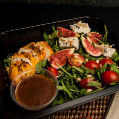 Grilled chicken breast with blue cheese Gorgonzola and salad with fig and sauce 