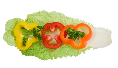 color pepper rings with a green parsley on the chinese cabbage leaf