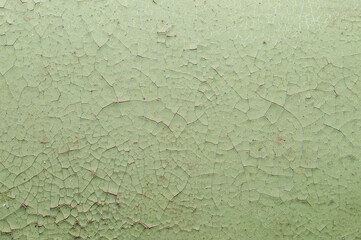 Old painted wall with cracked paint