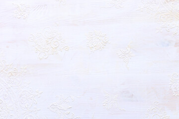 background of white wooden vintage wall with floral emboss details