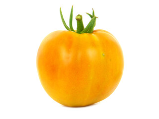 Fresh yellow tomato isolated on white