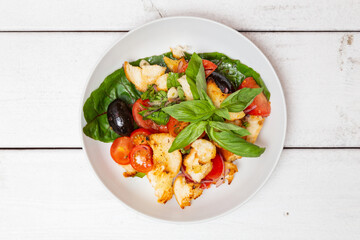 Fresh salad on a white plate