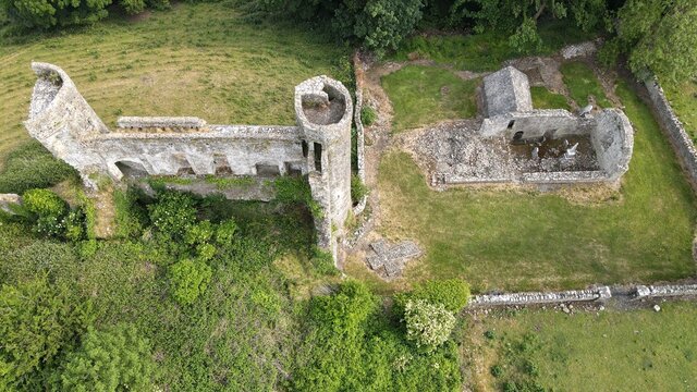 Aerial view. Ruins of Dunmoe Castle , Anglo-Norman donjon. Navan. Ireland ancient, architecture, brick, building, bush, castle, cloud, cloudy, day, distance, europe, fortress, grass, green, greenery,
