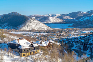 Picturesque Park City Utah winter landscape with snowy homes and frosted hills