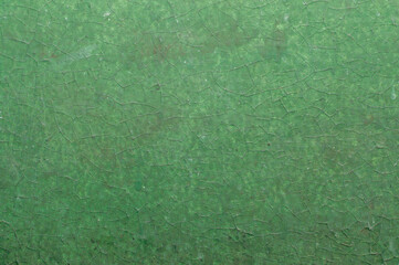 Old painted wall with cracked paint