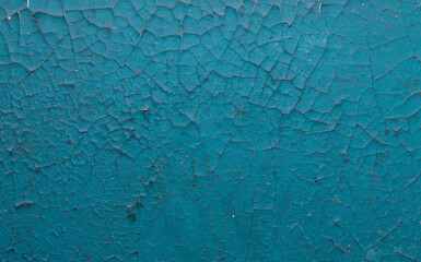 Old painted wall with cracked paint