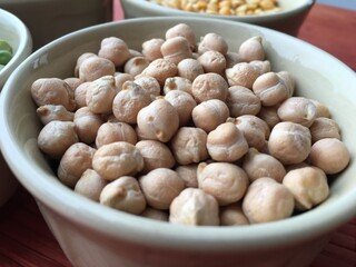 Full plate with chickpeas closeup. Gastronomic background for the design of the kitchen, cafe and restaurant.