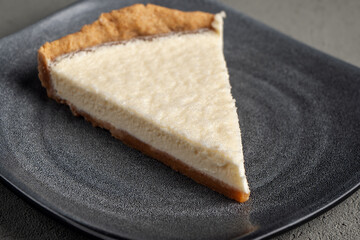 Vegetarian cheesecake on a gray plate