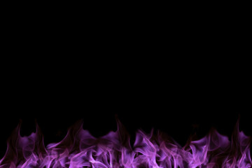 Purple lights in a black background. /Purple fire