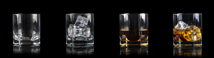 Set of four glasses for alcoholic drinks on black background