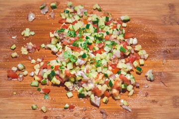 Chopped vegetables on wooden board
