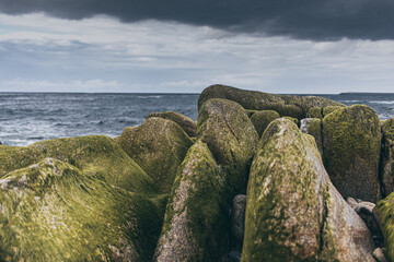rocks on the Atlantic coast and stormy clouds, Galicia