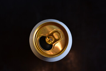 Can of beer on dark background