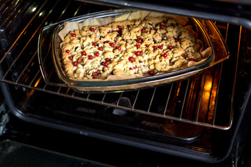 Appetizing homemade berry pie. Pie with red currants, gooseberries, black currants
