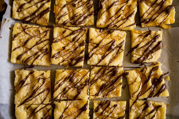 french pastry with peach and pineapple, decorated with chocolate.