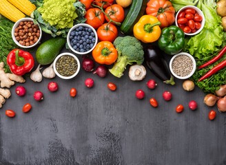 Healthy eating ingredients: fresh vegetables, fruits and superfood. Nutrition, diet, vegan food concept