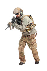 American soldier in uniform and with a rifle attacks on a white background, a commando with weapons