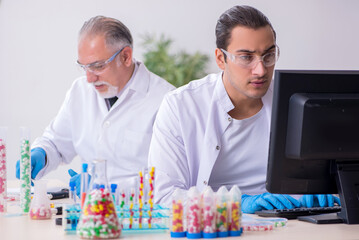 Two chemists working in the lab