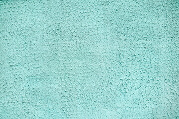 green decorative concrete wall, plaster light background, building wall