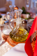 Fototapeta na wymiar carafe olive oil on a festive table