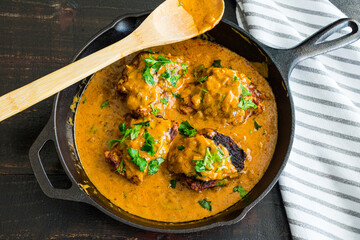 Hungarian Chicken Paprikash: Chicken thighs in a creamy paprika sauce