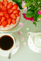 cup of coffee with strawberries