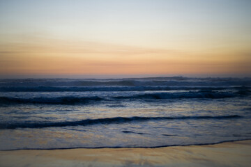 Fototapeta na wymiar Sunrise in the early morning over the Pacific Ocean in Byron Bay, Australia