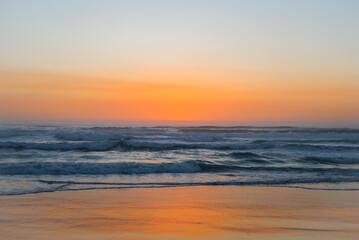 Fototapeta na wymiar Sunrise in the early morning over the Pacific Ocean in Byron Bay, Australia