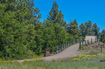 Fototapeta na wymiar Matt Kelly Urban Trail Bridge pedestrian overpass. Mountainous region in Flagstaff, Coconino County, Arizona United States
