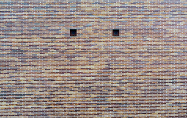 wallpaper with brick wall and two small windows