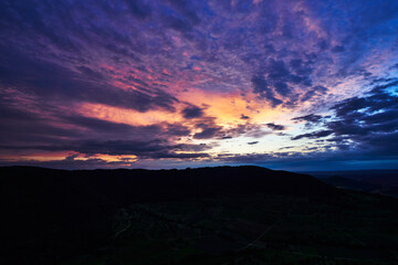 dramatic and colorful sky after sunset on the swabian alb