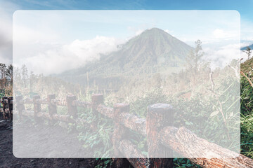 Photograph of high volcano with clouds on Java island in the frame