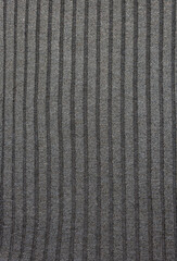 Vintage denim texture background: pocket with a button-down shirt close-up. Stylish pocket with button denim background. Closeup pocket on blue denim jean and button.