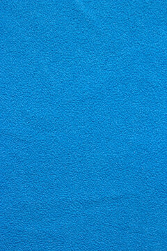 Background Blue Woolen Fabric. Blue flannel fabric texture background simple surface used backdrop or products design. Blue cloth background with fabric texture.