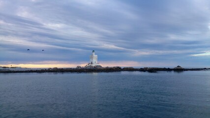 Fototapeta na wymiar lighthouse on the river