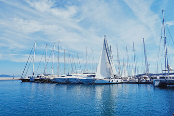 Yachts and boats in the harbor on Mediterranean sea coast, travel and leisure scene © Anneleven