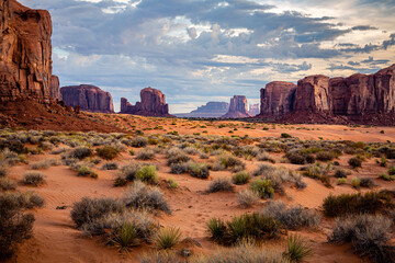 Morning in Monument Valley sand dunes and formations. Monument Valley Tribal Park, Arizona.