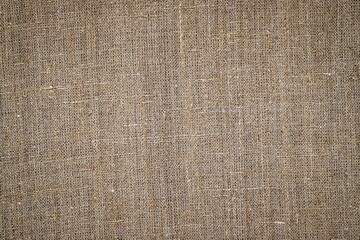 Ancient grey linen cloth, close up macro. Pure linen texture. Old hemp burlap fabric, closeup