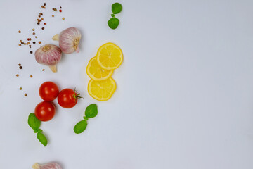 Natural spices with lemon and tomato.