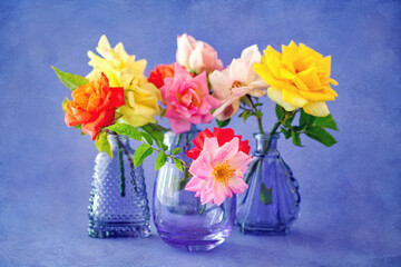 Beautiful bouquet of spring flowers in a vase on the table. Lovely bunch of flowers .
