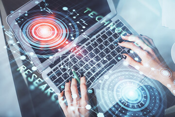 Double exposure of woman hands working on computer and data theme hologram drawing. Top View. Technology concept.