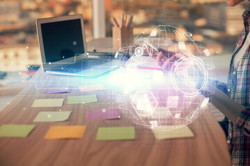 Double exposure of woman hands typing on computer and social network theme hologram drawing. People media concept.