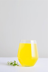 Healthy summer drink lemonade in a glass.