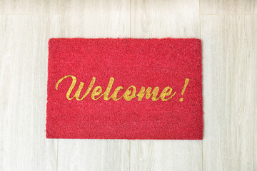 Door mat on wooden floor