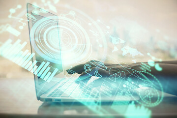 Double exposure of woman hands typing on computer and business theme hologram drawing. Success concept.