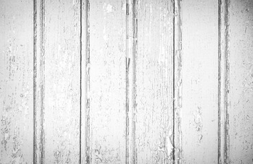 Old crackled black and white painted surface. Vintage wooden wall or floor with cracked paint.